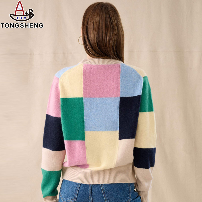 The back view of a light crewneck cashmere sweater