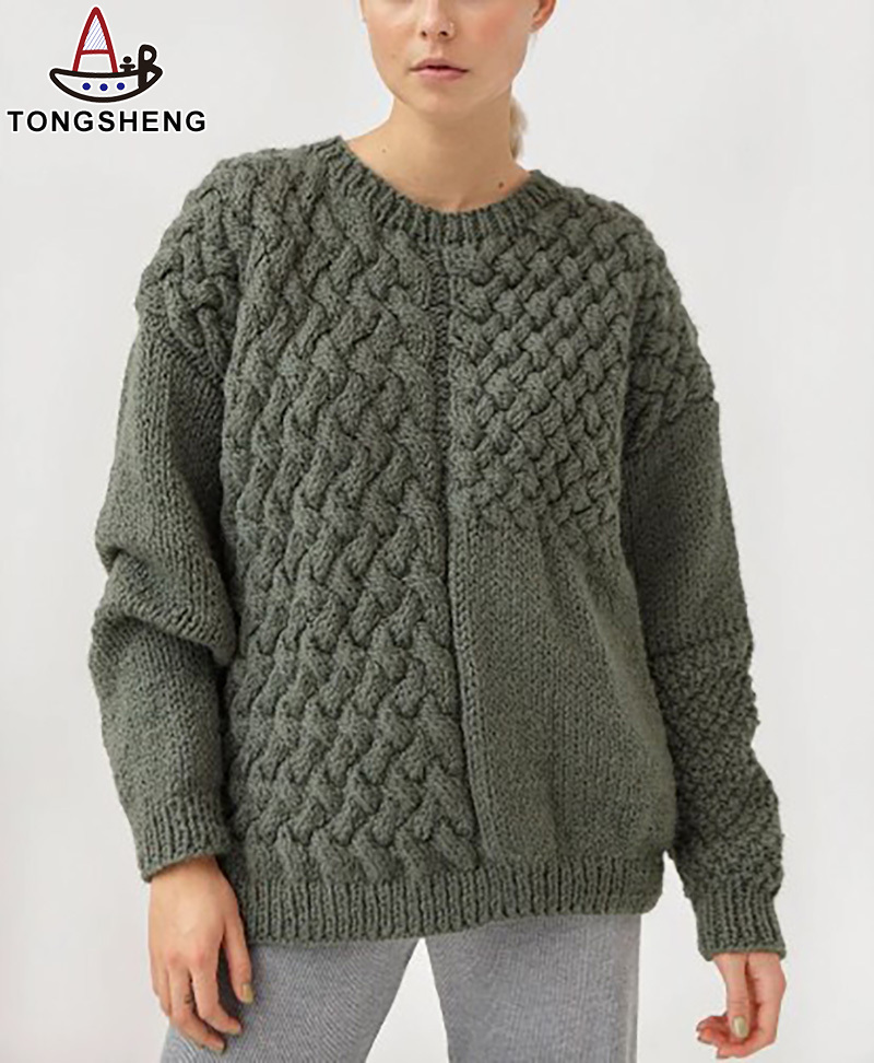 Dark green intricately woven women's sweater