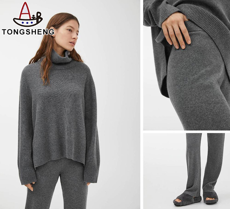Grey turtleneck sweater with skinny knitted trousers for extra stretch