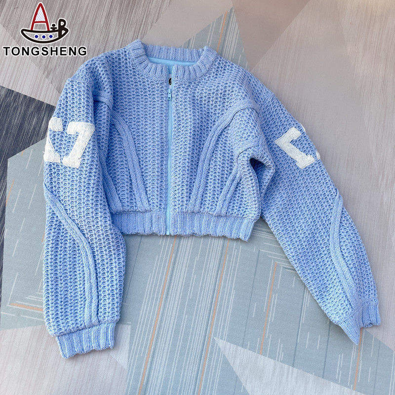 Blue knitted suit top with three-dimensional lines, full of design
