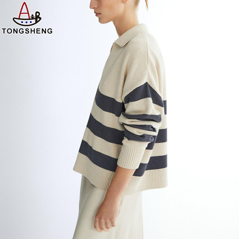 The striped sweater has an ungathered hem for more layering