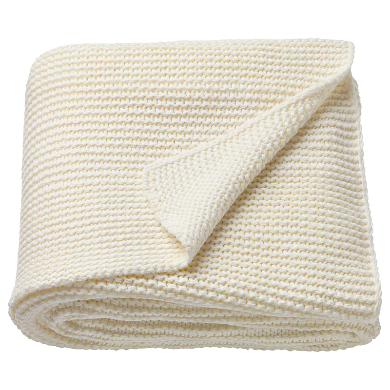 This white cotton blanket is reversible knit