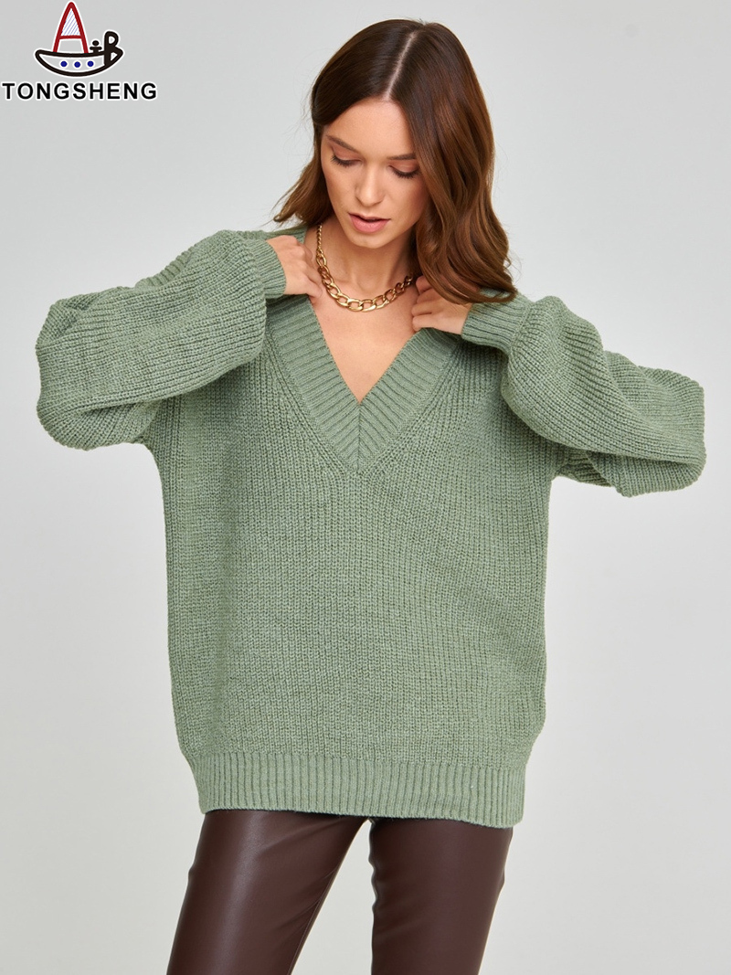 Dark green V-neck sweater is low-key and special