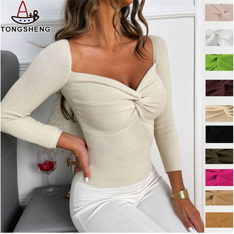 Skinny knitted sweater with large V neck available in a variety of colors to choose from