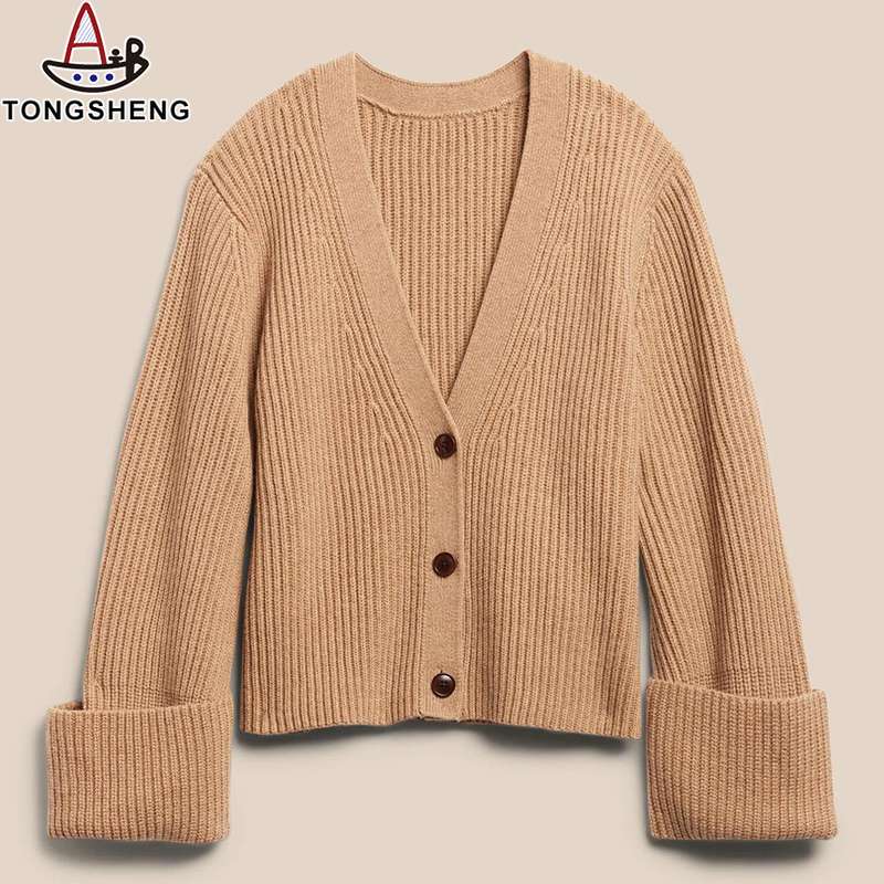 Brown cashmere cardigan has three buttons and can be worn with any interior