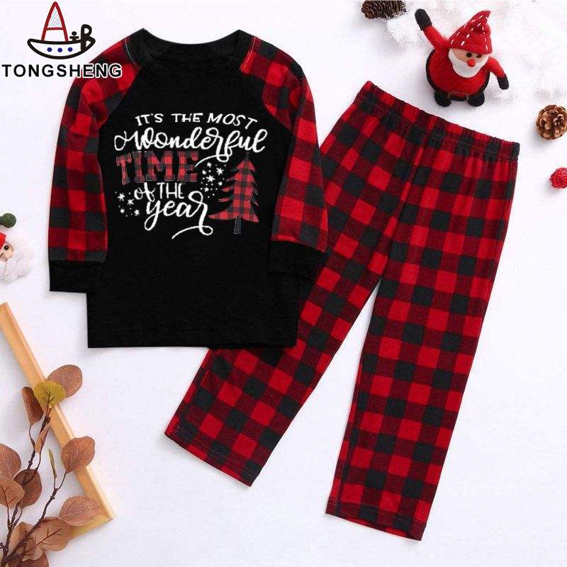 Red and black pajamas with simple lettering and Christmas tree.jpg