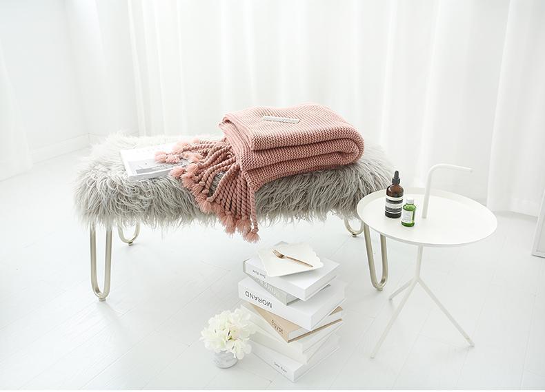 Pink cotton fringed blanket fits well with the current home