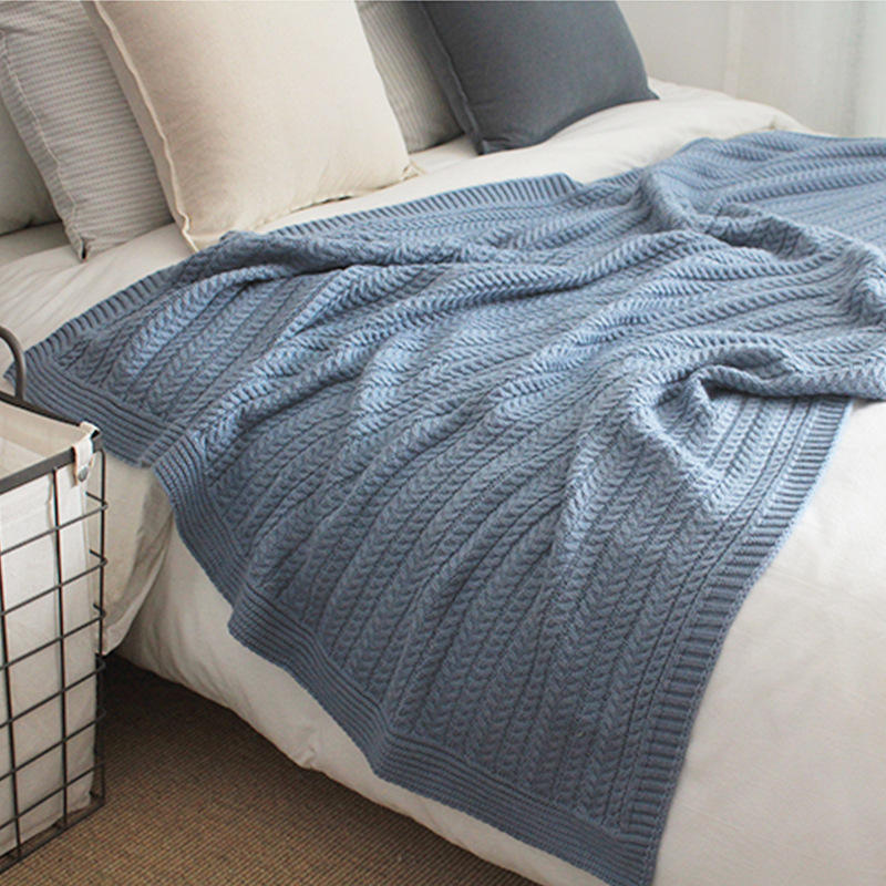 Sky blue merino blanket on bed